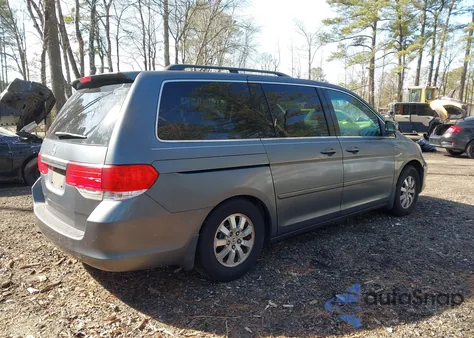 2010 Honda Odyssey Ex-L z USA, uszkodzony, nr VIN 5FNRL3H71AB099707